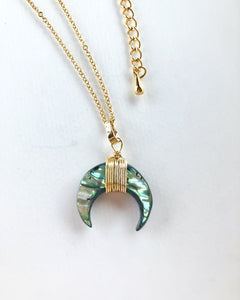Abalone Ox Horn Pendant strung from a 17" 24k gold filled chain.